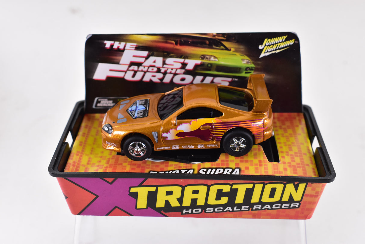Toyota Supra Gold Xtraction Chassis Ho Scale Racer | Auto World