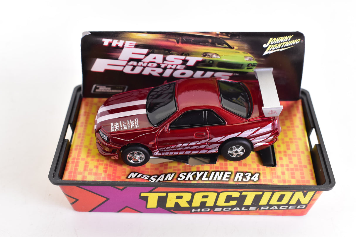 Nissan Skyline R34 Red Xtraction Chassis Ho Scale Racer | Auto World