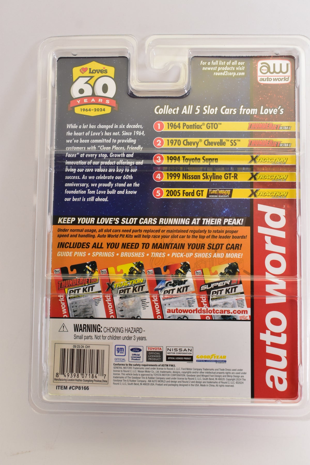 Loves 60th anniversary car collectible display featuring various classic vehicles for Auto World CP8166