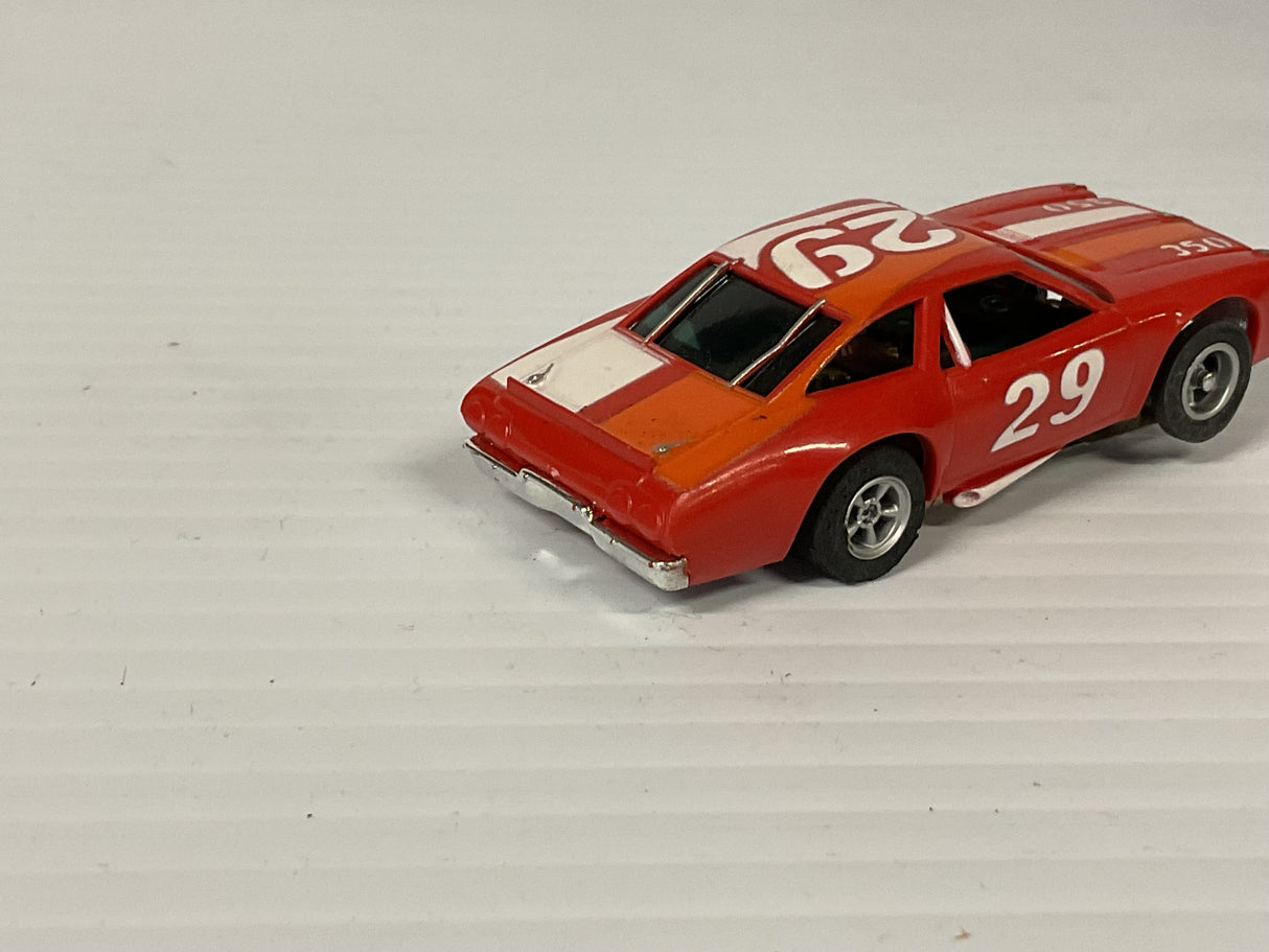 Aurora AFX non-magnatraction lighted Chevelle Stocker red/white/orange #29 | 1975 | Aurora - AFX