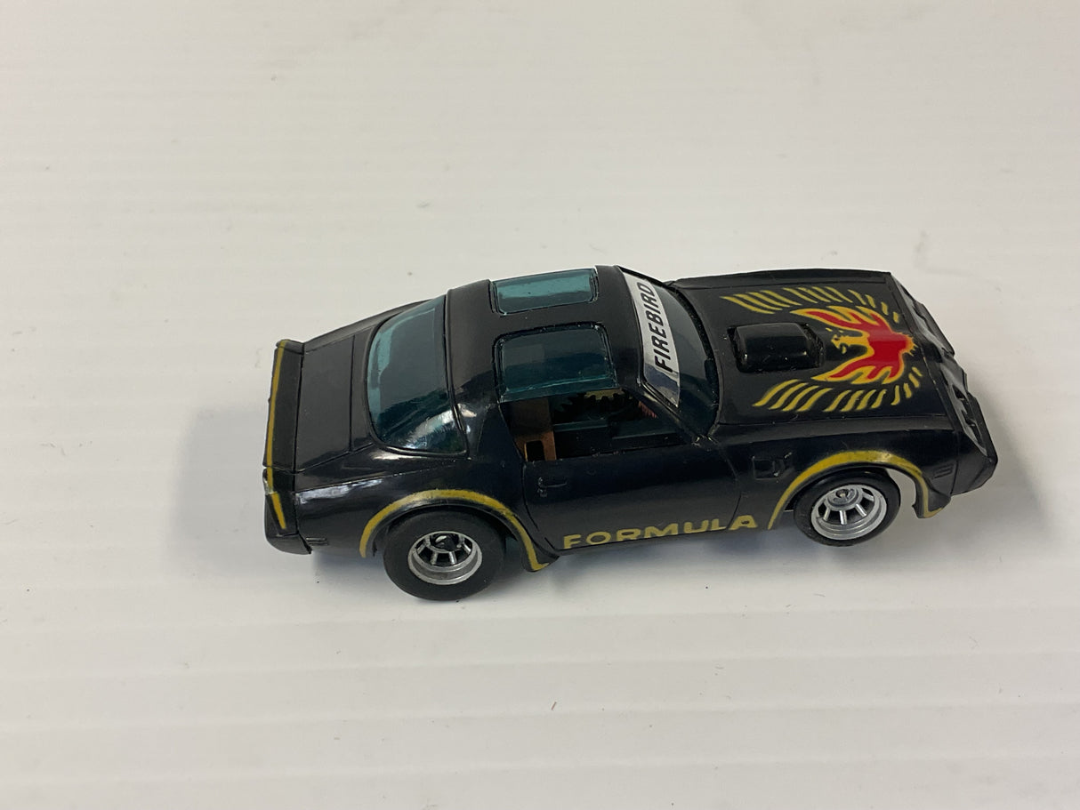 Aurora AFX magnatraction Pontiac, Firebird Trans Am, black/gold/red bird | 1981 | Aurora - AFX