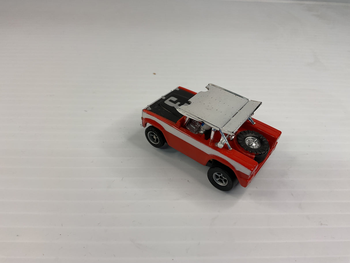 Aurora AFX non-magnatraction Ford Baja Bronco Red/Black/White #3 | 1769 | Aurora - AFX