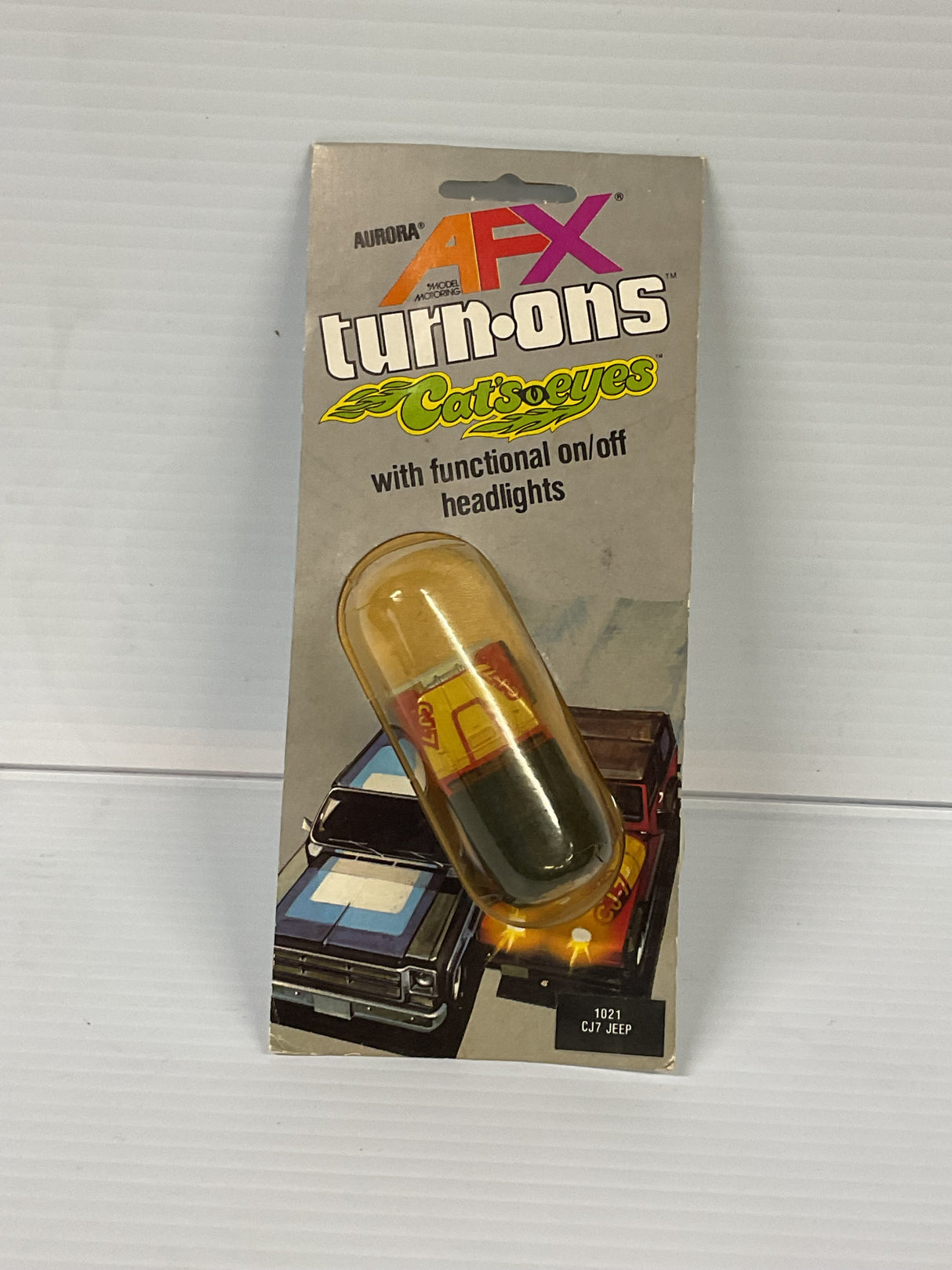 Aurora AFX magnatraction Turn-ons Cj7 Jeep W/headlight | 1021 | Aurora - AFX