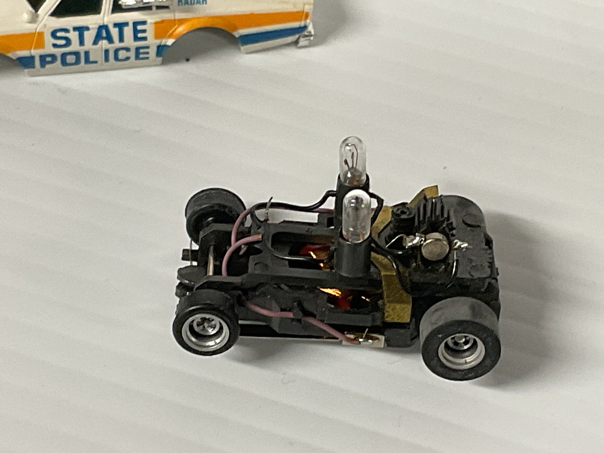 AFX Magnatraction Lighted State Police Car w/m/b | 1050 | Aurora - AFX