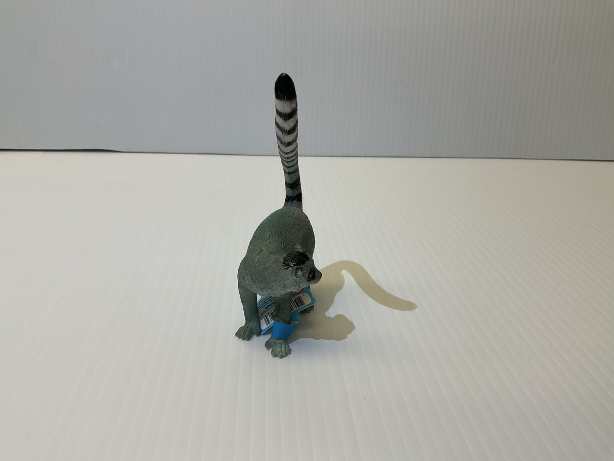 Stuffed grey lemur toy standing on a white surface for Mamejo MAJ55028
