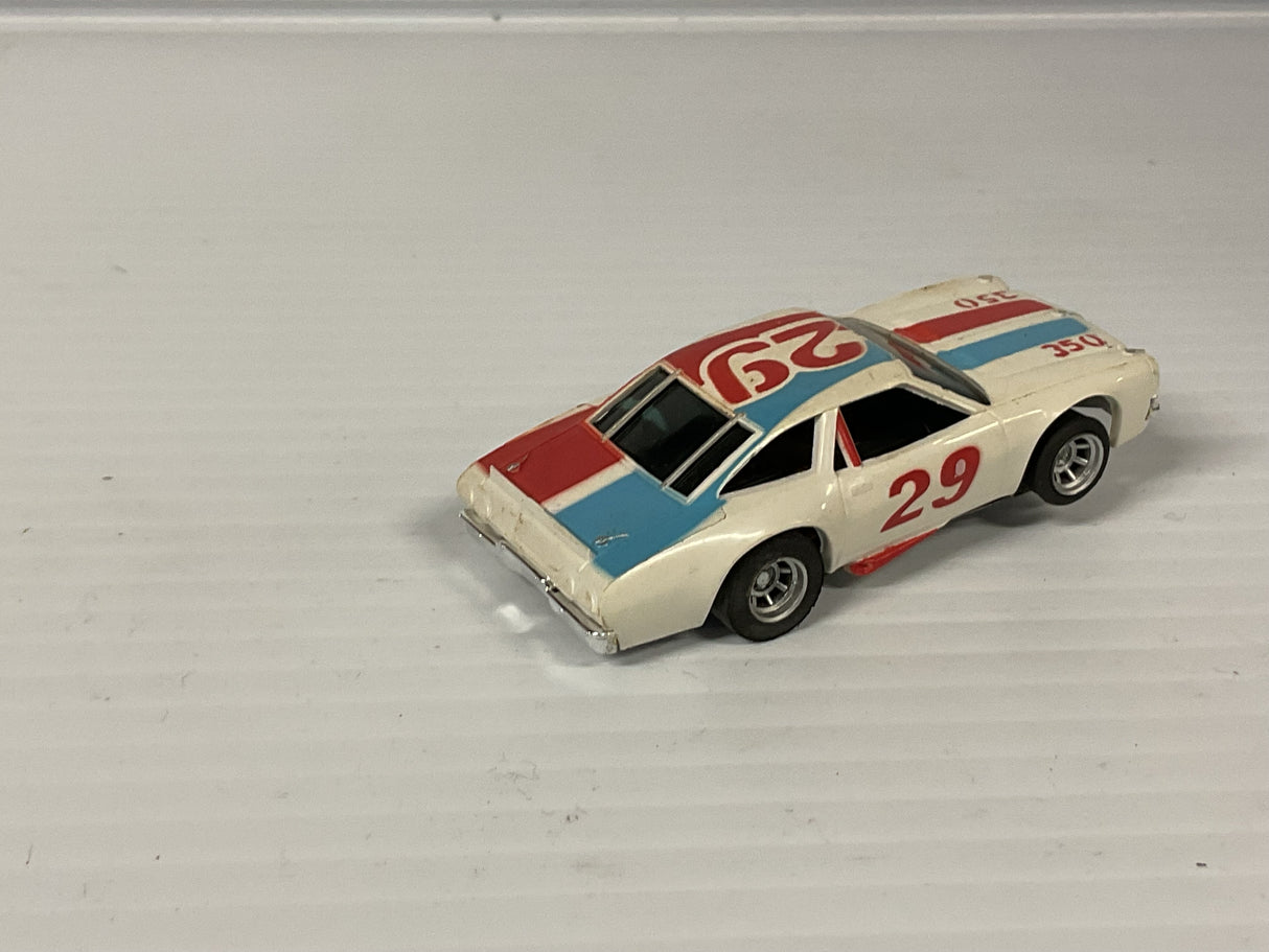 Aurora AFX magnatraction lighted Chevelle Stocker white/red/blue #29 | 1929 | Aurora - AFX