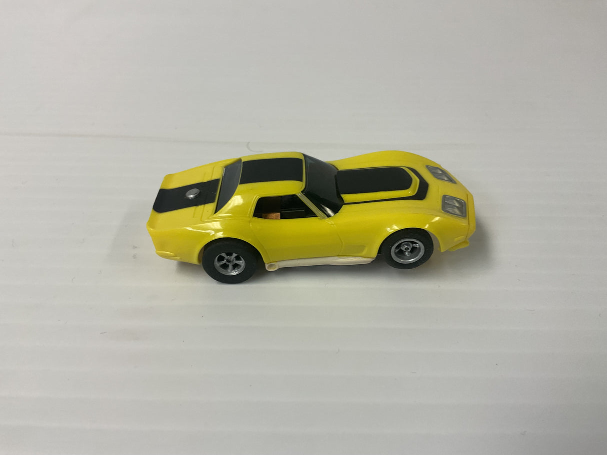 Aurora AFX non-magnatraction Corvette, a production, one piece, body yellow with black stripes | 1703 | Aurora - AFX