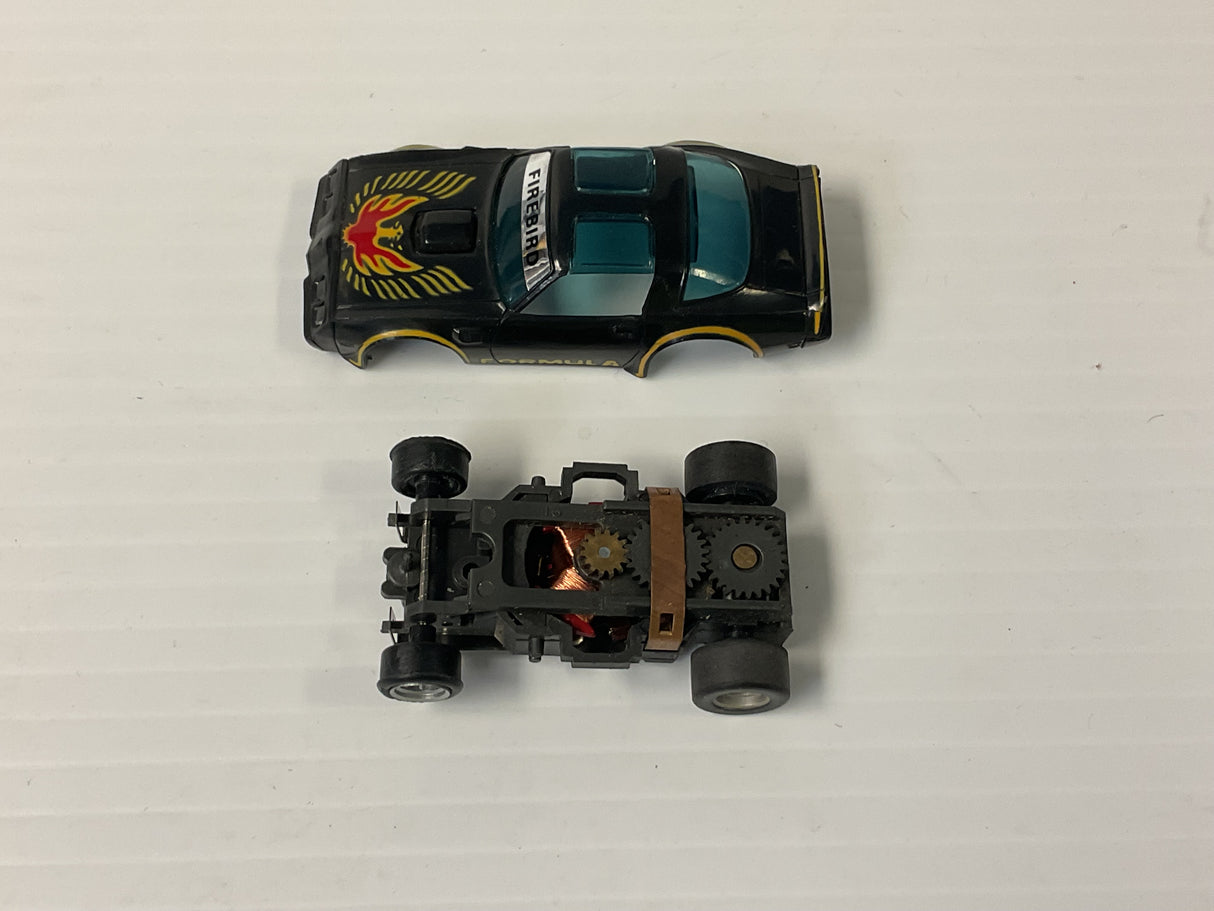 Aurora AFX magnatraction Pontiac, Firebird Trans Am, black/gold/red bird | 1981 | Aurora - AFX