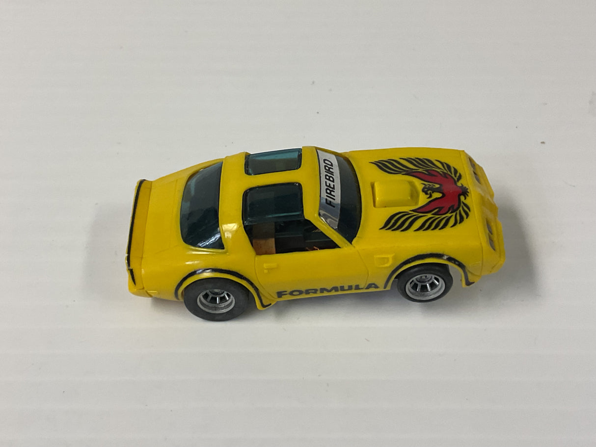 Aurora AFX magnatraction Pontiac, Firebird Trans Am, mustard/black/red bird | 1981 | Aurora - AFX
