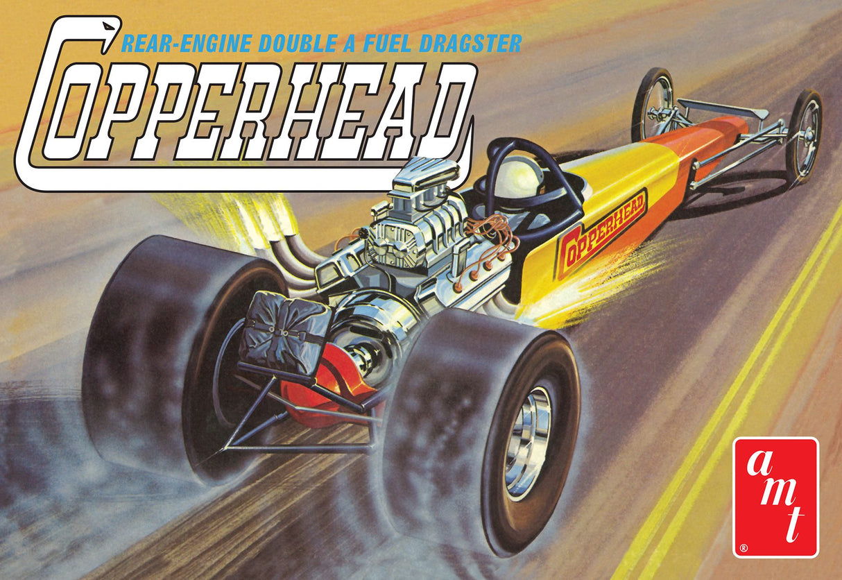Yellow and orange rear-engine dragster model kit on a track for AMT AMT1282