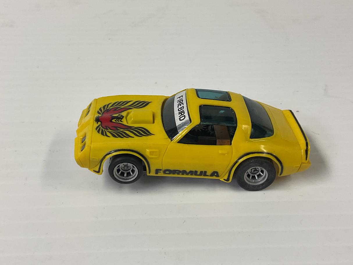 Aurora AFX magnatraction Pontiac, Firebird Trans Am, mustard/black/red bird | 1981 | Aurora - AFX
