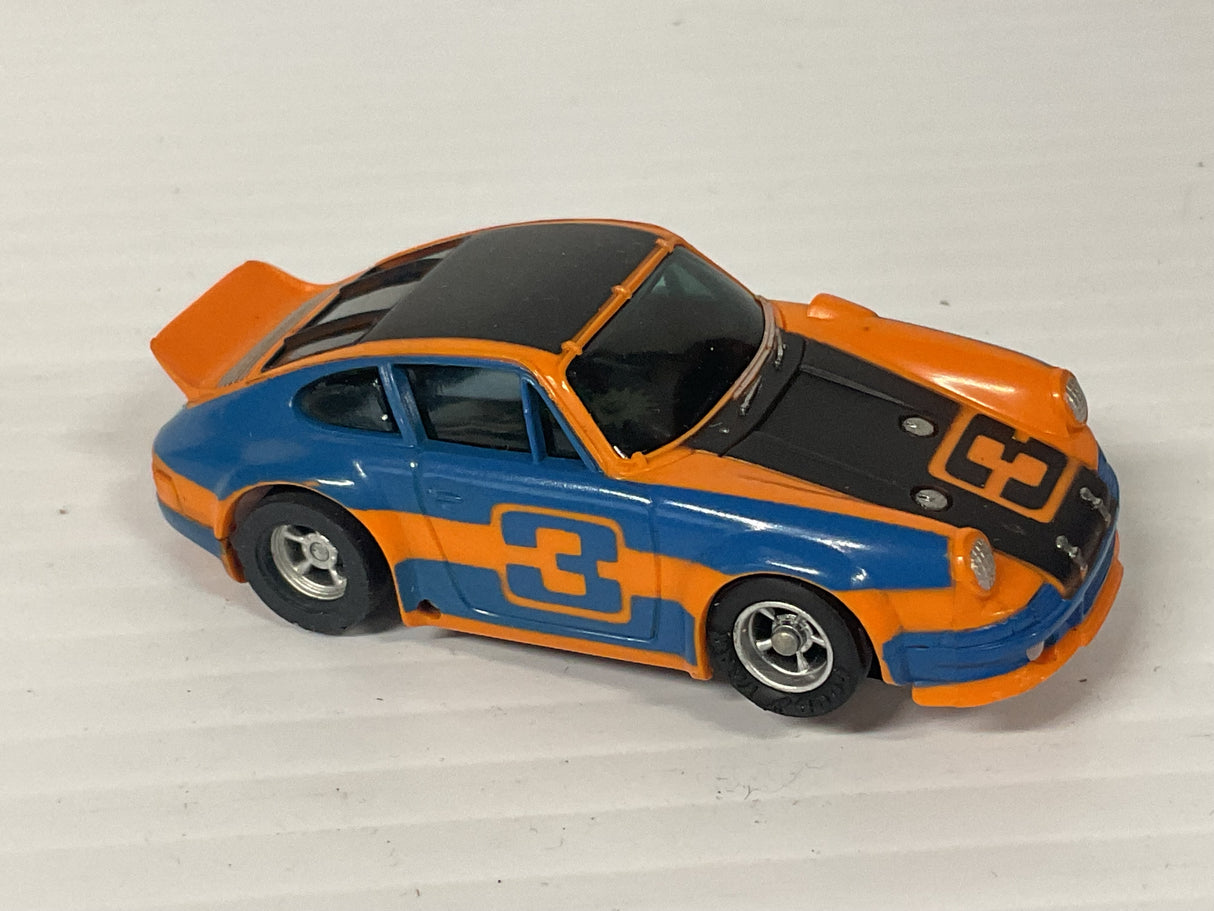 Aurora AFX magnatraction Porsche Carrera Orange/Blue/black #3 | 1933 | Aurora - AFX