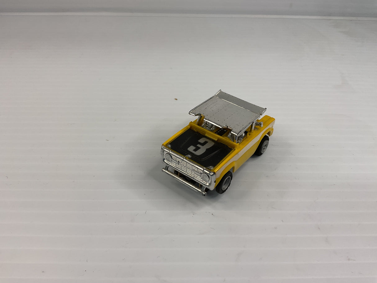 Aurora AFX non-magnatraction Ford Baja Bronco Yellow/Black/White #3 | 1769 | Aurora - AFX
