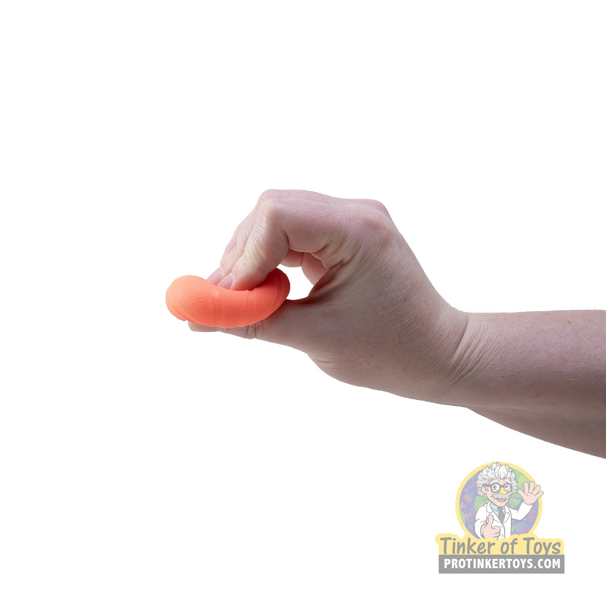 Hand holding a small, orange, noodle-shaped toy for Nee Doh HSTND