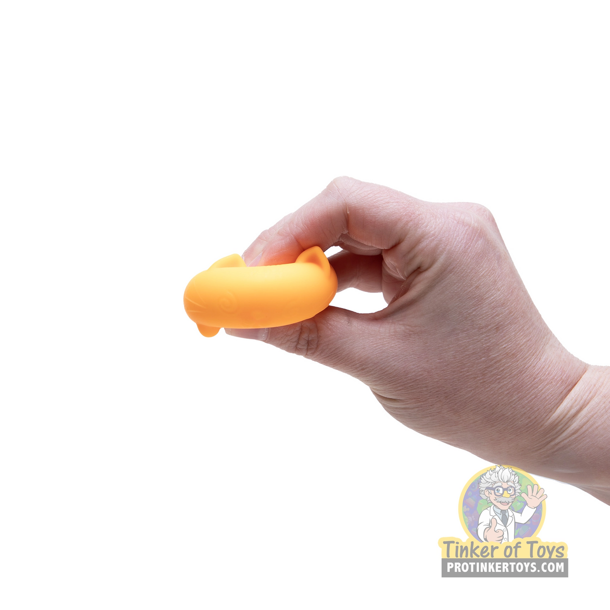 Orange kitten toy held in a hand for Schylling MPCCTND