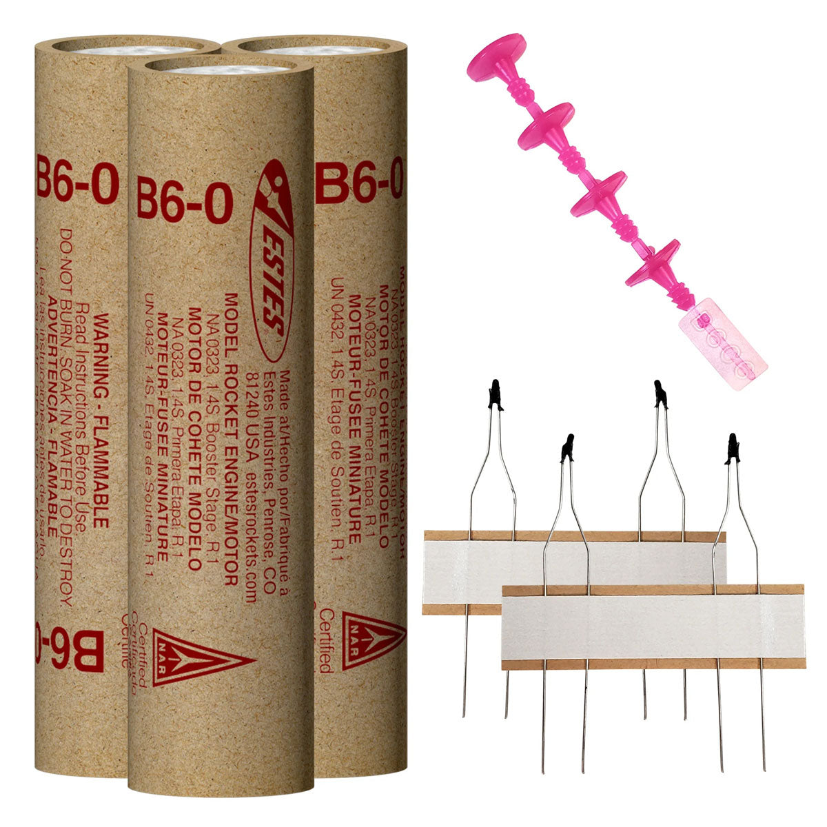 Three cardboard rocket engine tubes and a pink igniter set for Estes EST10046