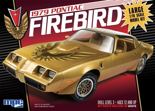 Gold 1979 Pontiac Firebird model kit assembled, showing front and side view for MPC MPC862