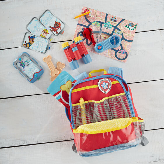 PAW Patrol play set with backpack, cards, and accessories on white wood for Melissa and Doug 33271