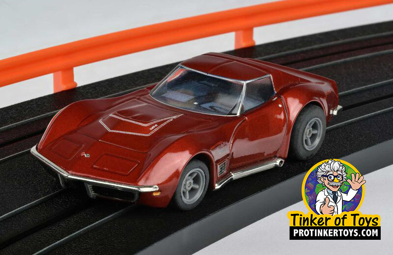 Red metallic 1970 Corvette LT1 slot car on a track for AFX/Racemasters 22038, alternate track view