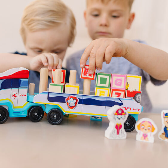 Kids play with PAW Patrol ABC block truck and alphabet blocks for Melissa and Doug 33272