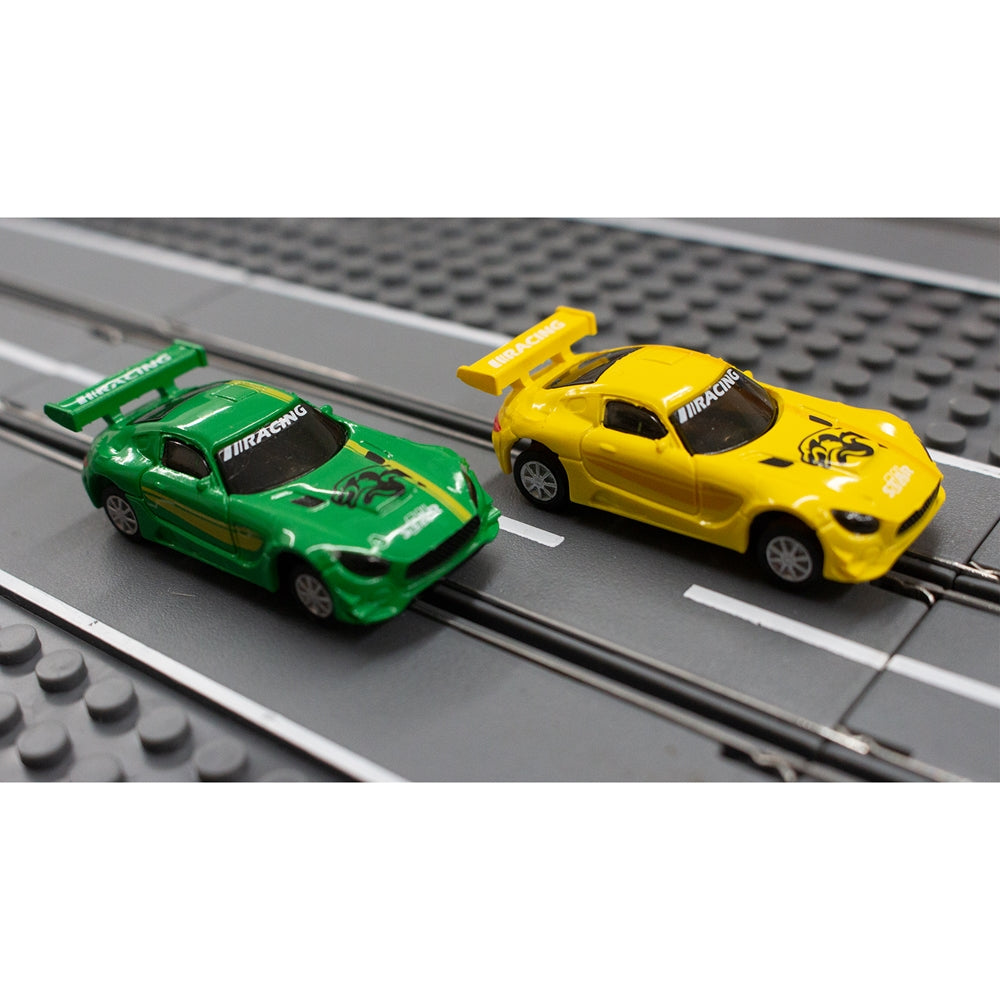 Two small, colorful race cars on a track surface for Jupiter Creations 20012