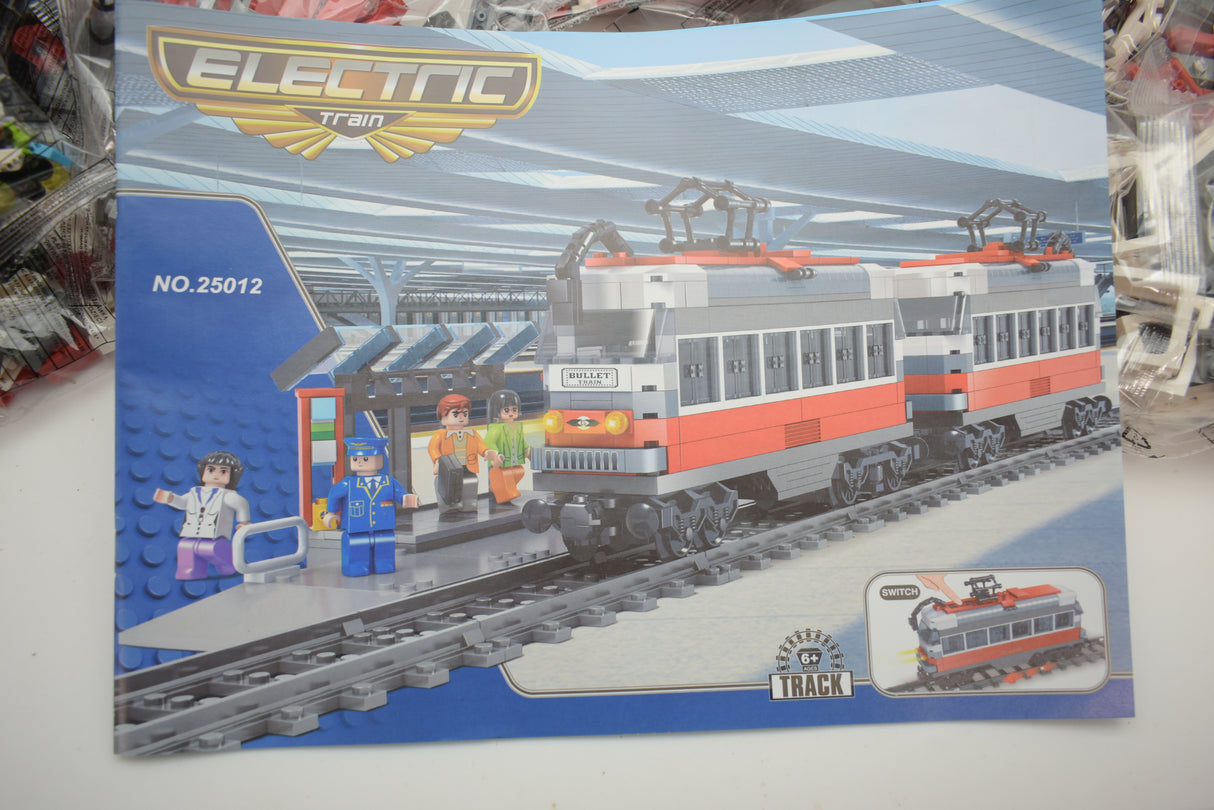 Toy train set featuring a passenger train and station for building play for Electric Train AUS25012