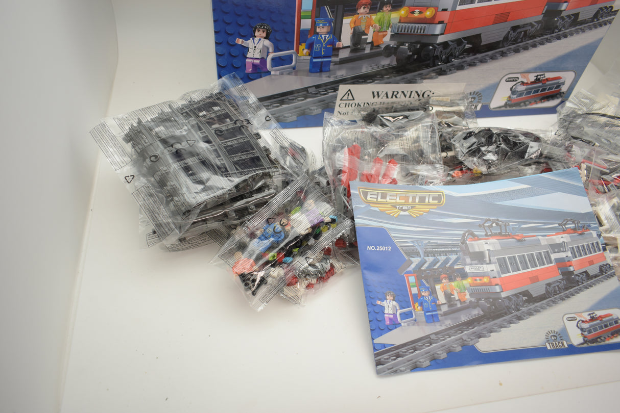 Train set components: passenger train, station, and track pieces for Electric Train AUS25012