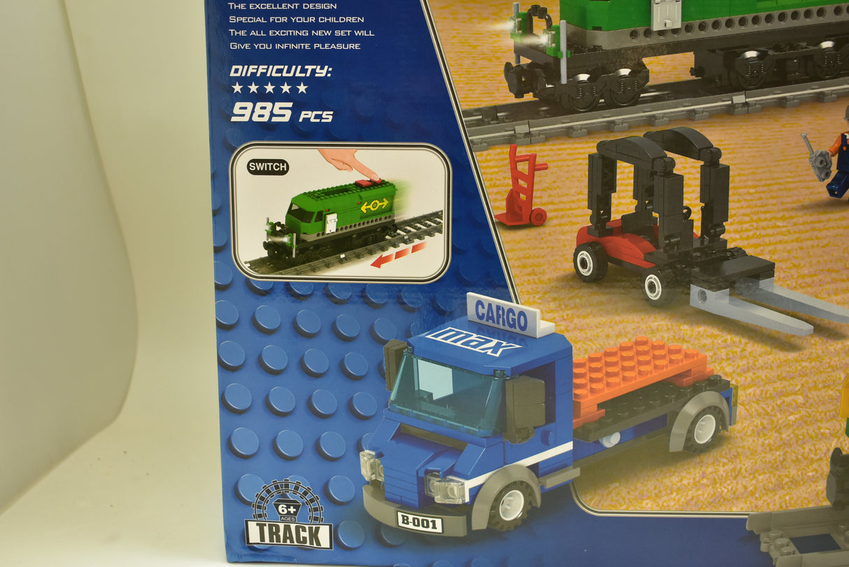 Toy train set featuring diesel freight, crane, and track pieces for Electric Train AUS25121