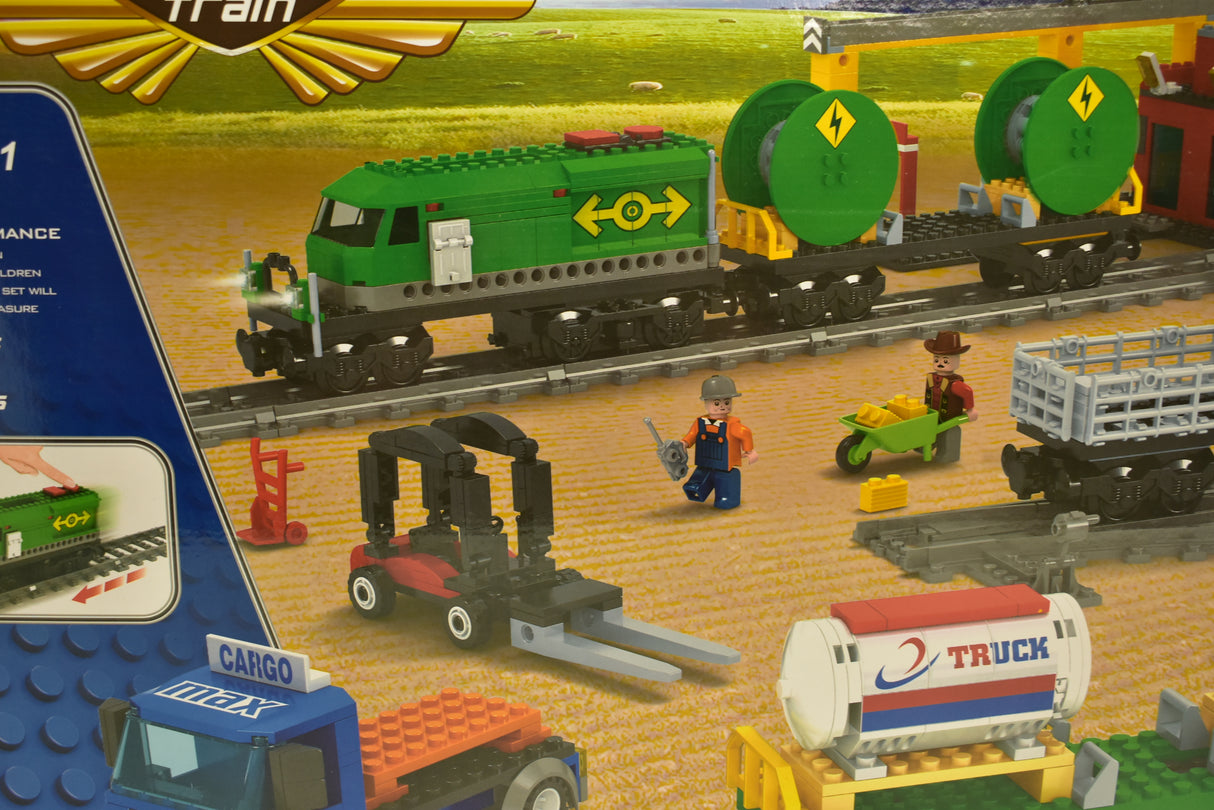 Toy train set with diesel engine, crane, and various accessories on tracks for Electric Train AUS25121