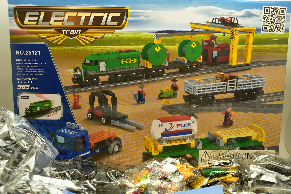Toy train set featuring diesel freight, crane, and accessories on tracks for Electric Train AUS25121
