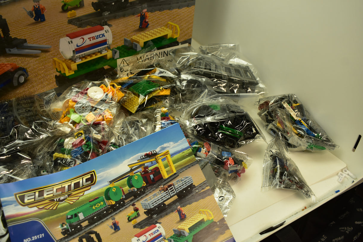 Toy train set with diesel freight train, crane, and accessories for Electric Train AUS25121