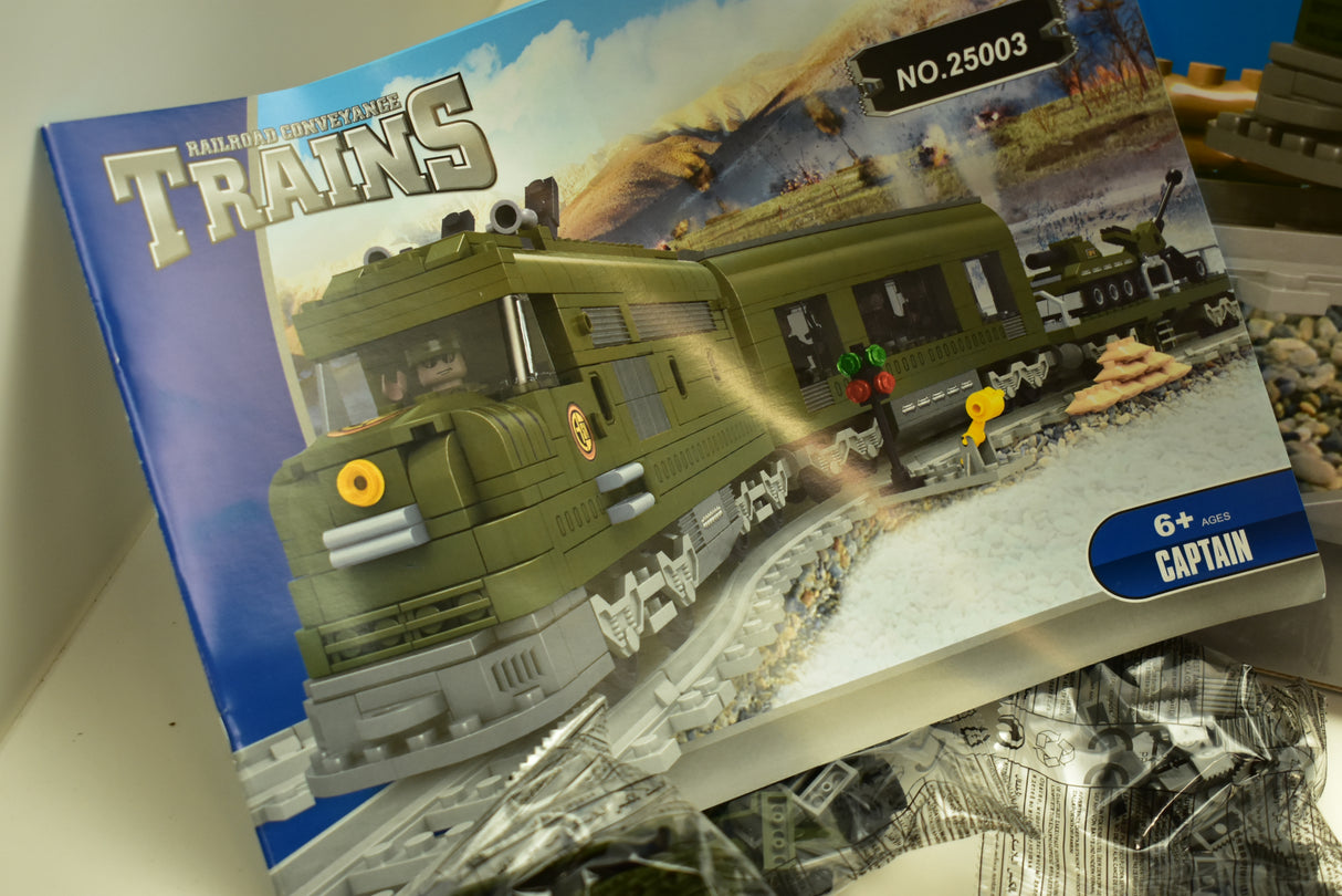 Green train set box art showing a military train on tracks for Railroad Conveyance Trains AUS25003