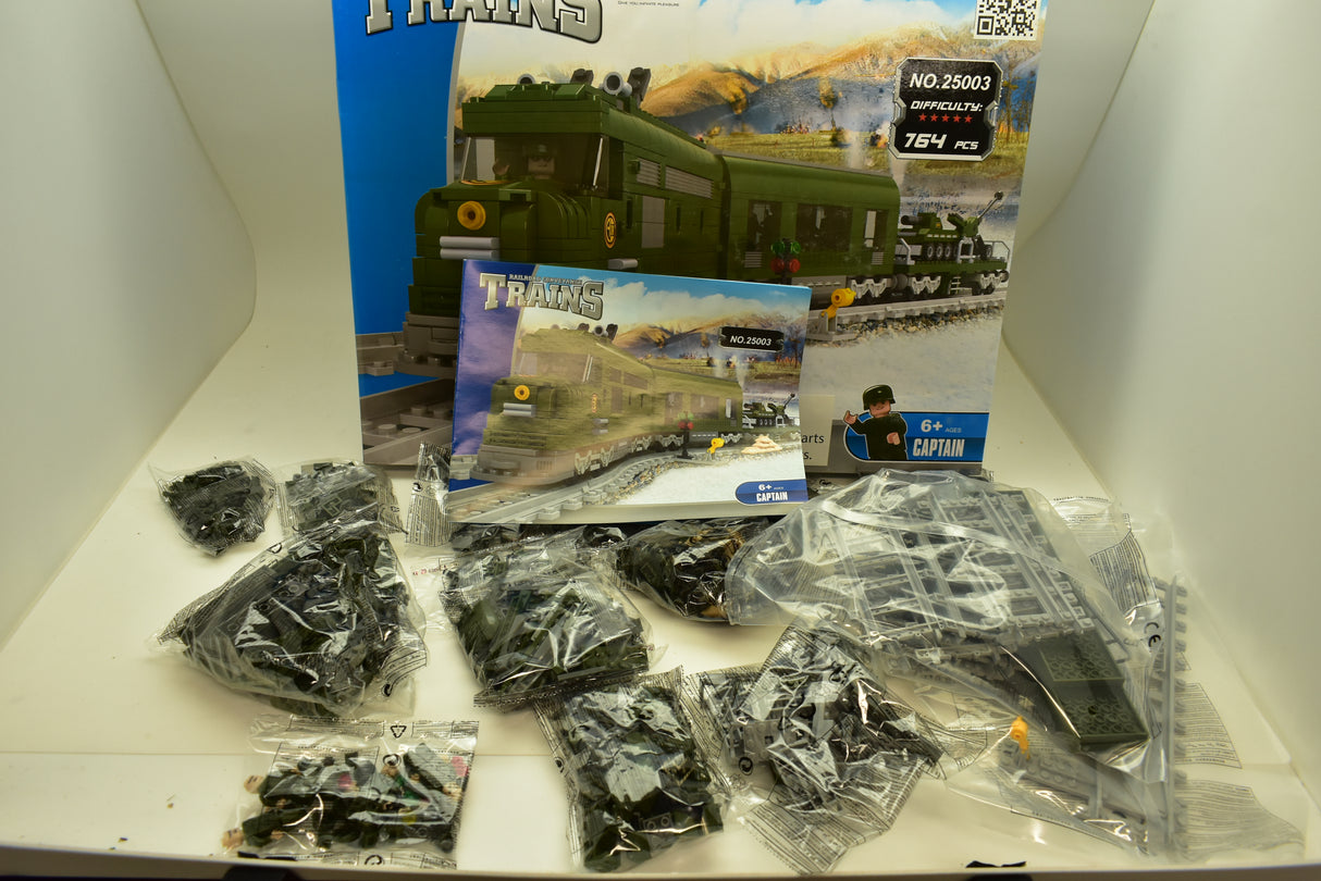 Train set box with model train pieces laid out for assembly for Railroad Conveyance Trains AUS25003