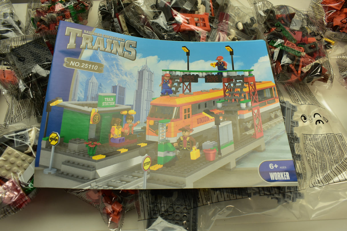 Lego set featuring an orange diesel train and station building for Railroad Conveyance Trains AUS25110
