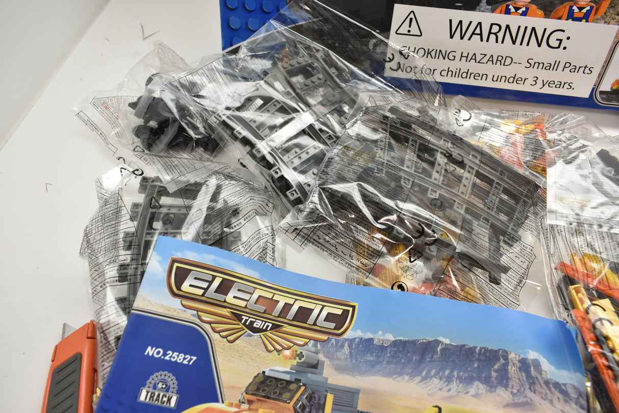 Train set box art showing a diesel switcher on a flat car for Electric Train AUS25827