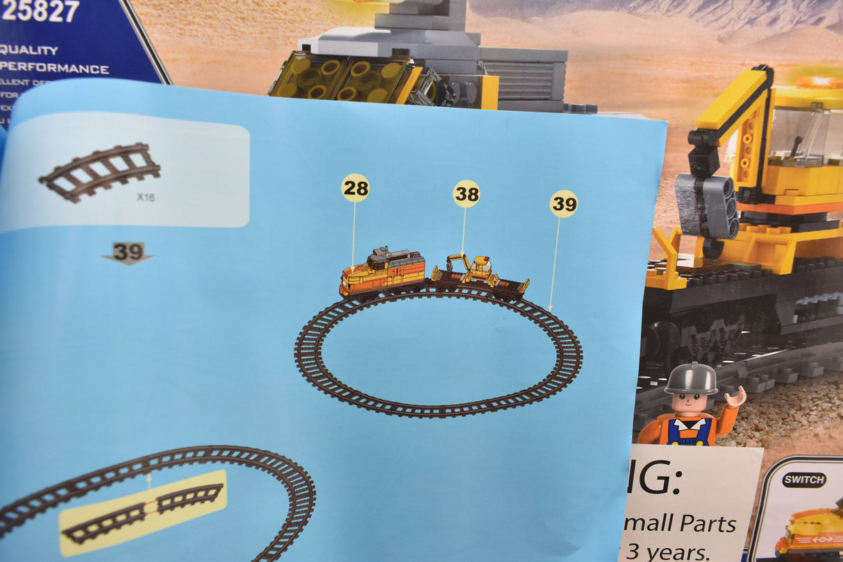 Instructions showing train and vehicle assembly steps for a model set for Electric Train AUS25827