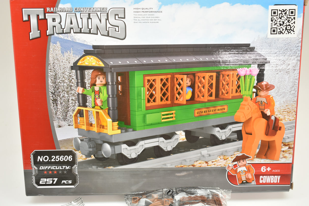 Toy train set: passenger car, cowboy figure, and track pieces for building for Railroad Conveyance Trains AUS25606