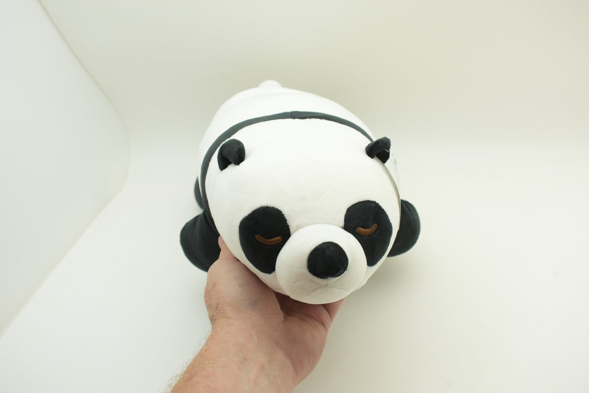 Stuffed panda toy held in a hand against a white background for Poptoy 5044