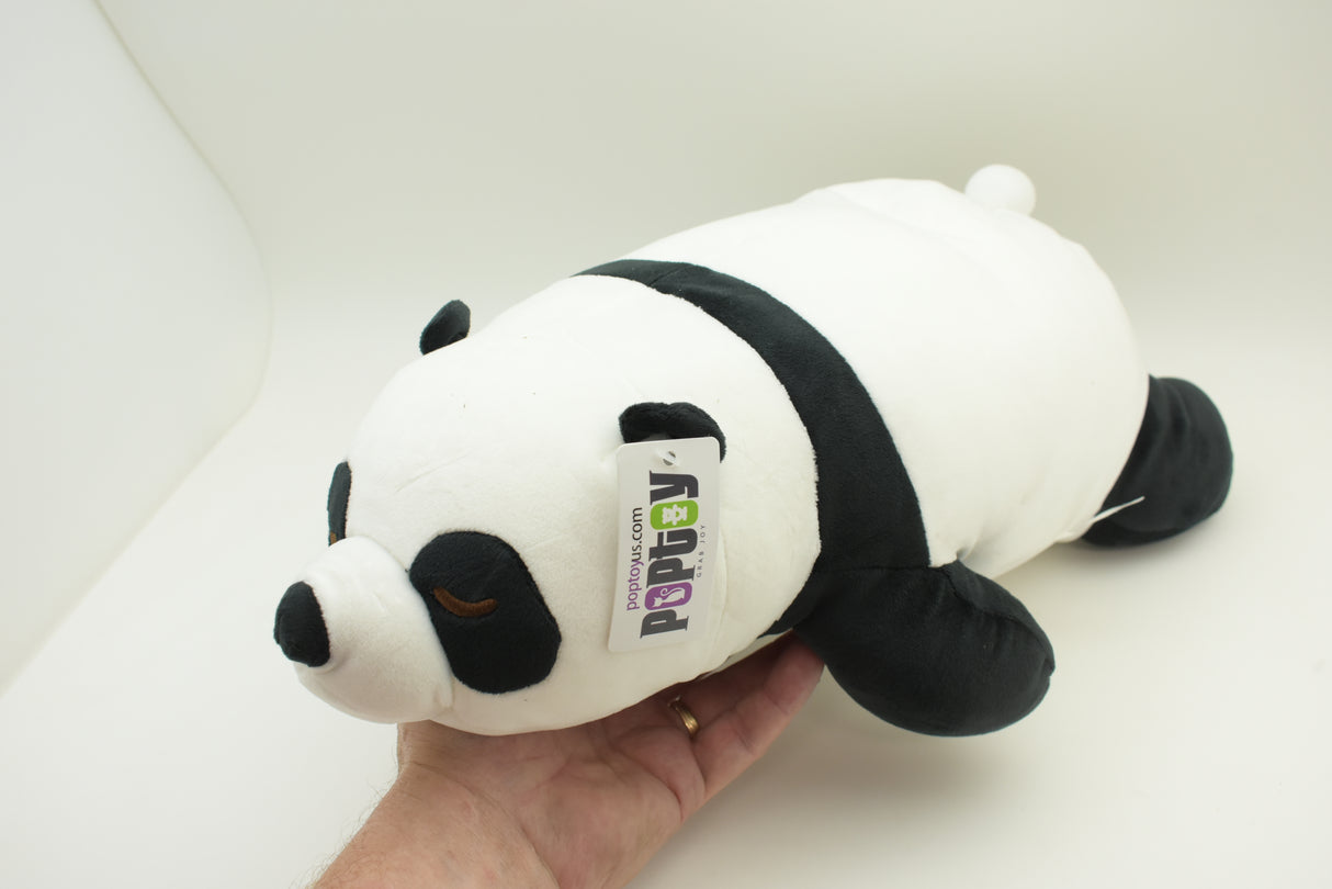 Stuffed panda toy with black markings, held in a hand for Poptoy 5044