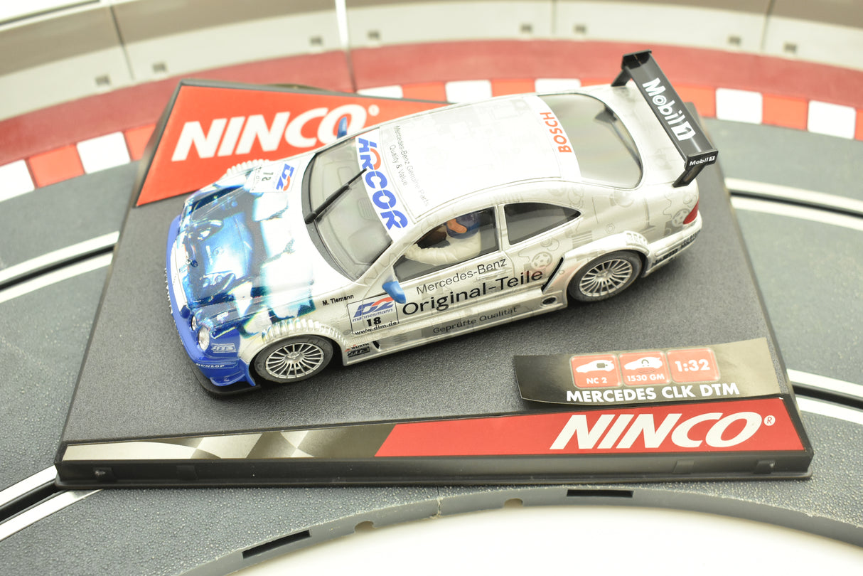 Silver Mercedes CLK DTM model car on a track mat for Ninco 50235