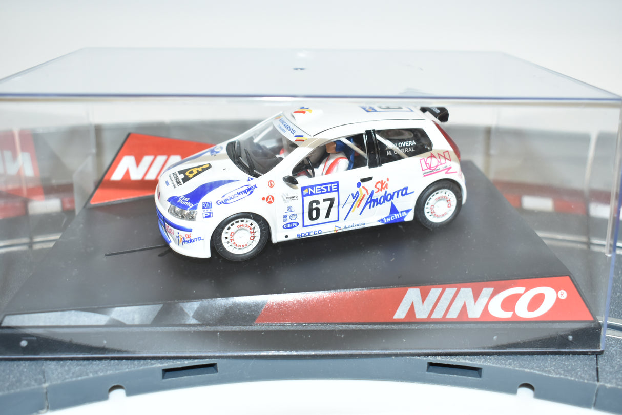 Slot car of a white Fiat Punto race car with number 67 for Ninco 50298