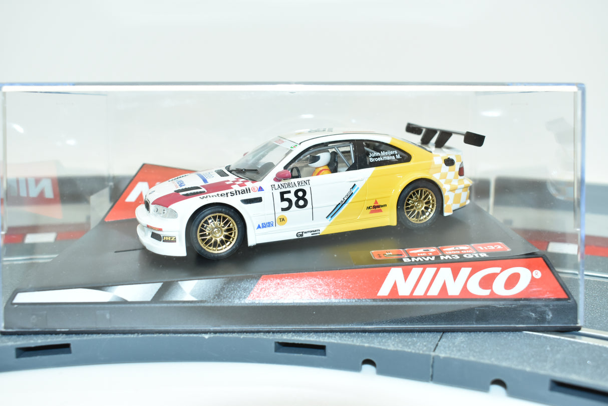 Yellow BMW M3 GTR race car model with number 58 for REH Ninco 50295