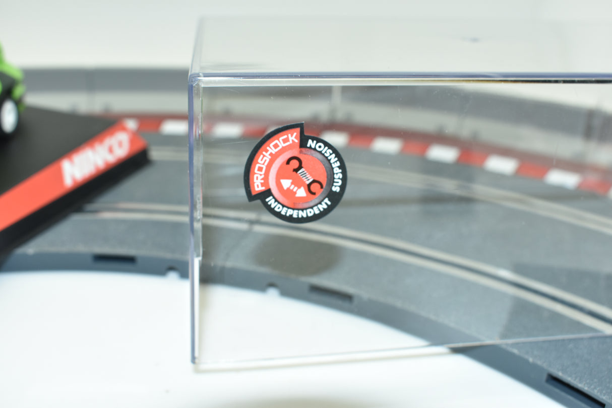 ProShock logo on a clear acrylic piece near a race track section for Ninco 50436