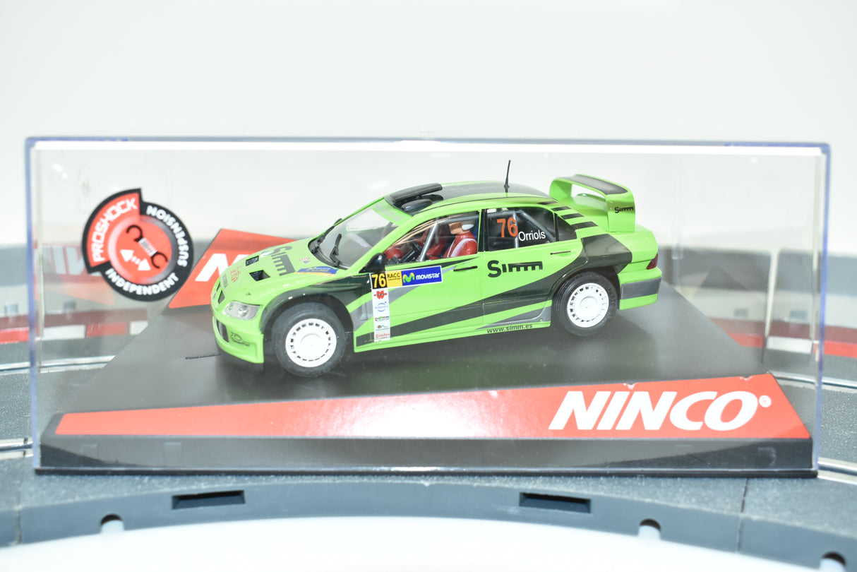 Green and black scale model of a Mitsubishi Lancer race car for Ninco 50436