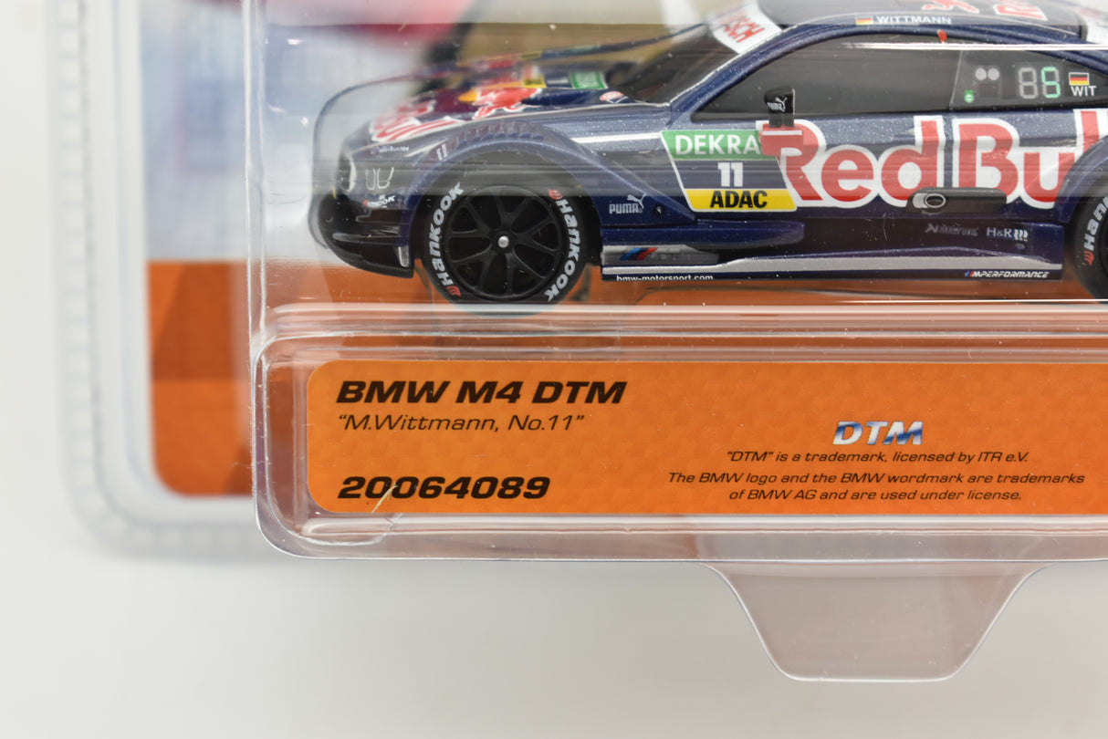 Slot car of a BMW M4 DTM race car in red and blue livery for Carrera Go 20064089