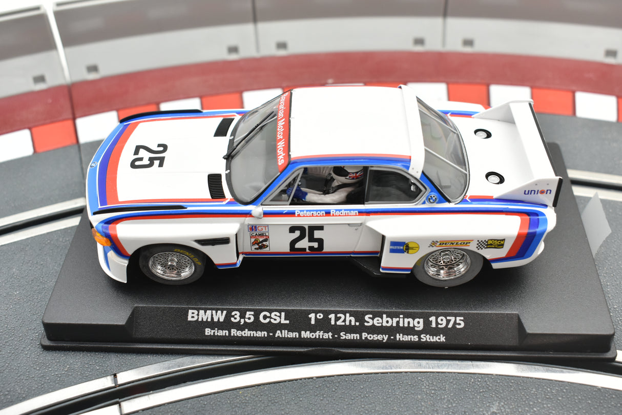 Model car of a 1975 BMW 3.5 CSL race car on a display base for Fly Car 99011