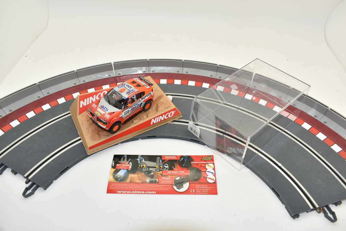 Red Mitsubishi Pajero Evo Dakar 2006 slot car on track for ZZ Expired Kim Collection 50392