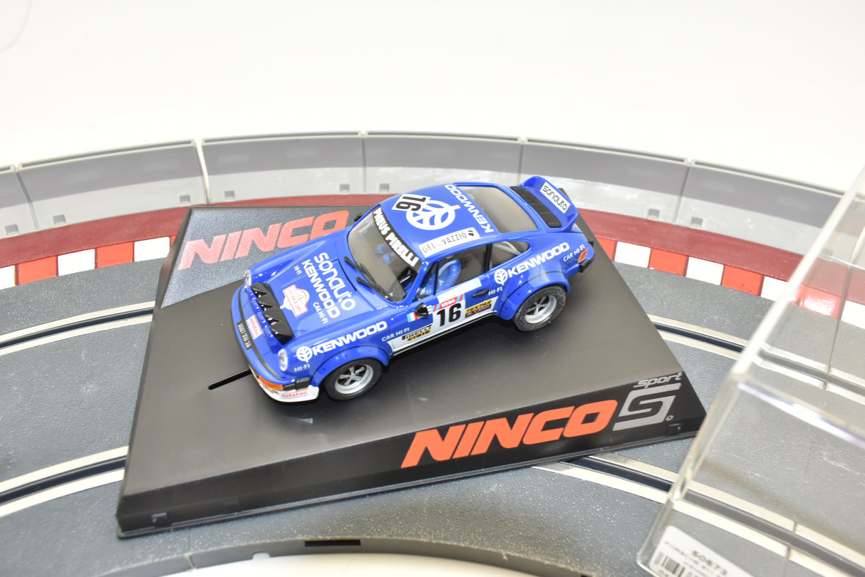 Blue Porsche 911 race car on a black track base for ZZ Expired Kim Collection 50573