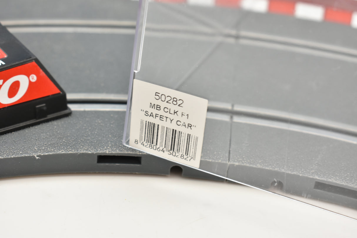 Product label showing "50282 MB CLK F1 'SAFETY CAR'" on a track piece for Ninco