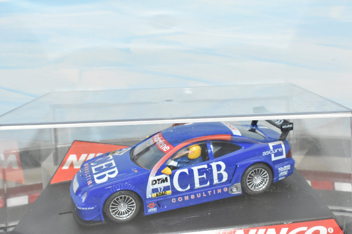 Blue race car model, Mercedes CLK DTM "CEB," displayed in a case for Ninco 50287